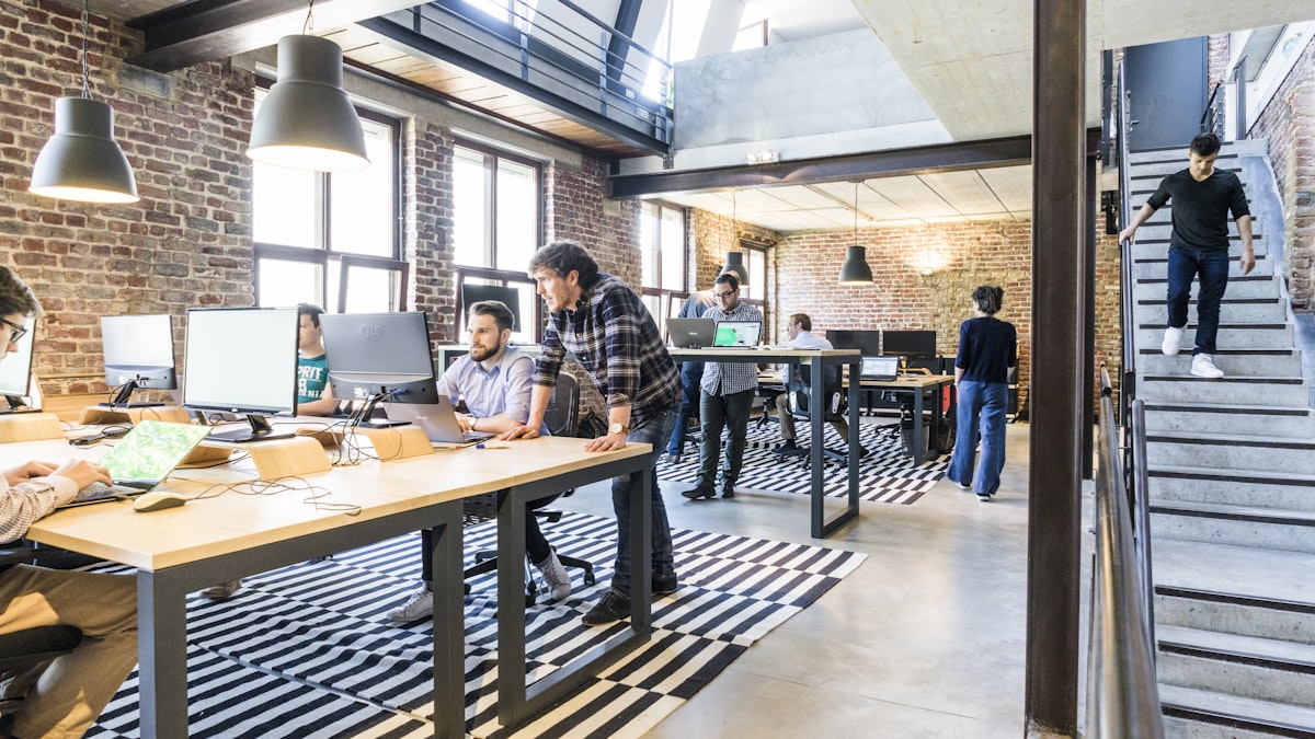 Founder preparing initial startup capital budget on laptop